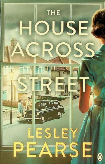  The house across the street